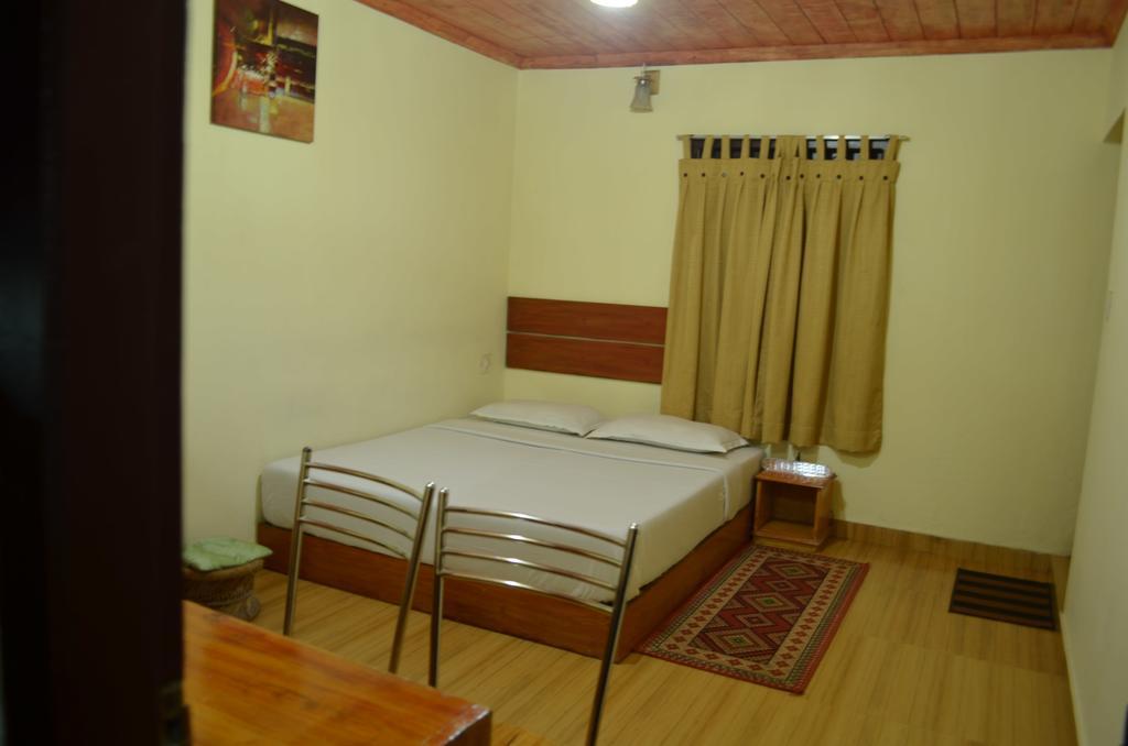 Rheinberg Town Haus Hotel Munnar Ruang foto